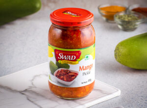 Mango Pickles 400gm By SWAD Mango pickles served in glass bottle pack of 400gm